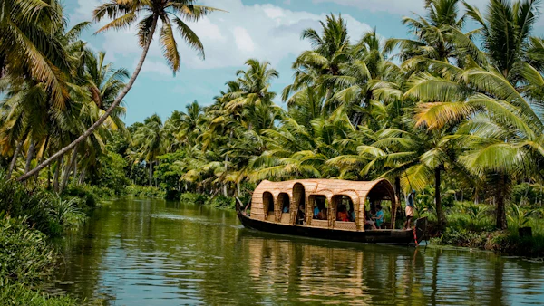 Kerala houseboat on Alleppey backwaters at sunset